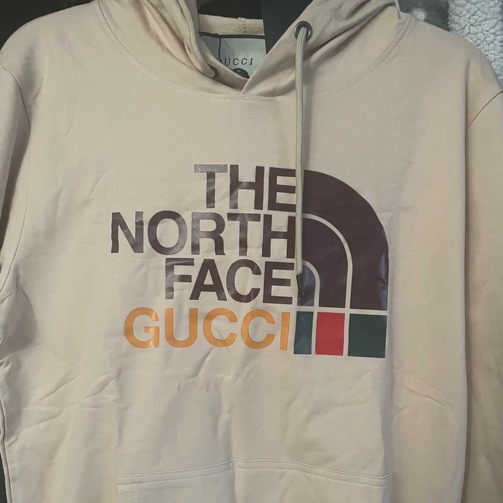 Gucci Sweater. New with tags. Never worn or even tried on. Make me an offer!